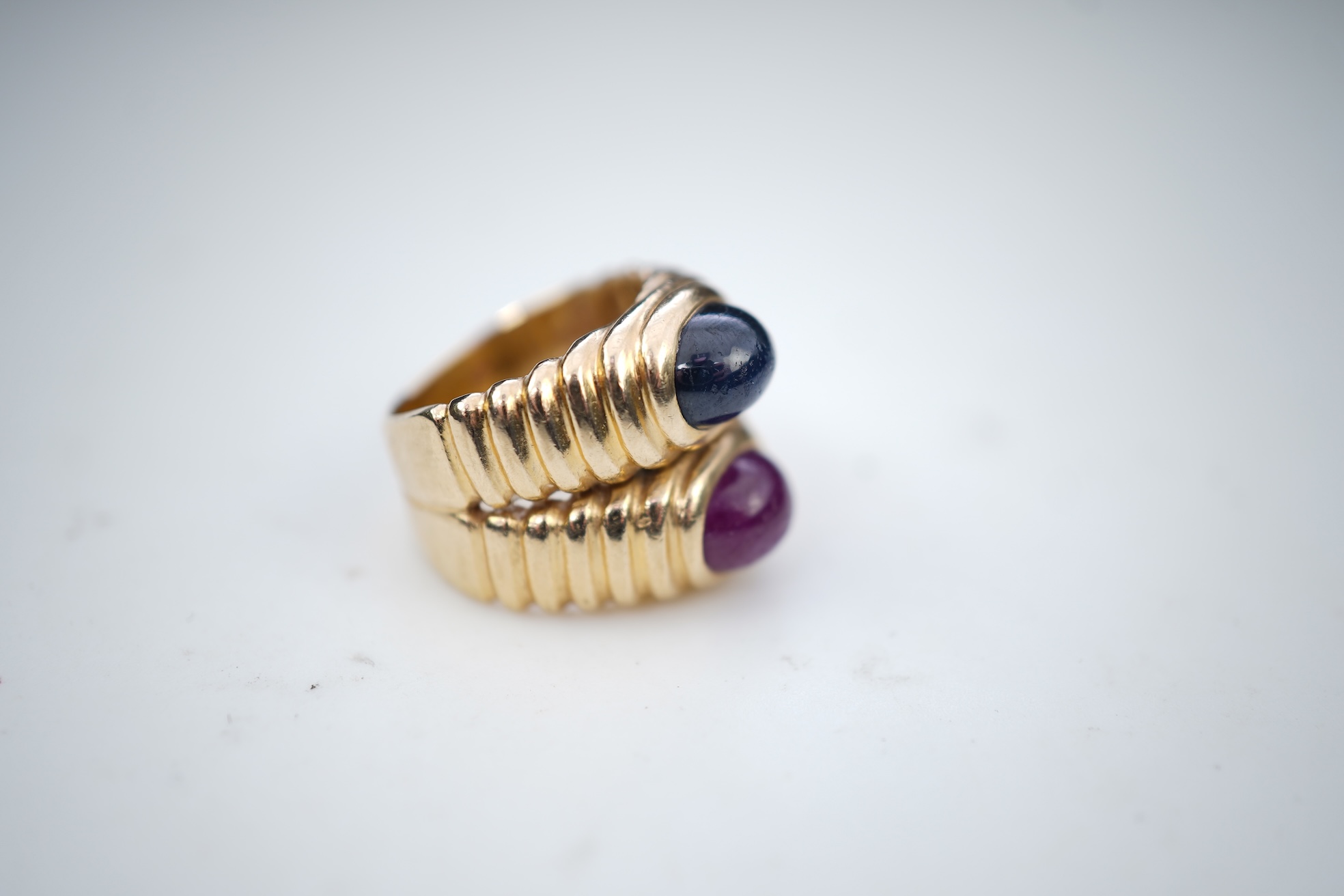 A sapphire and ruby ring